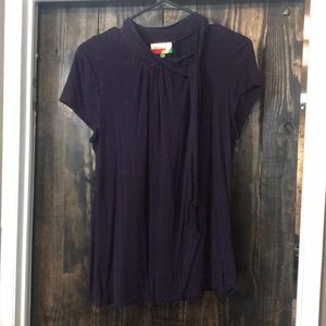 Purple tie at neck shirt